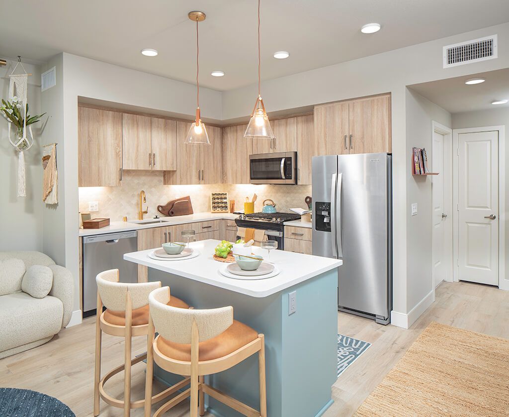 Rendering sand design package kitchen at Rivair Apartment Homes in San Diego CA
